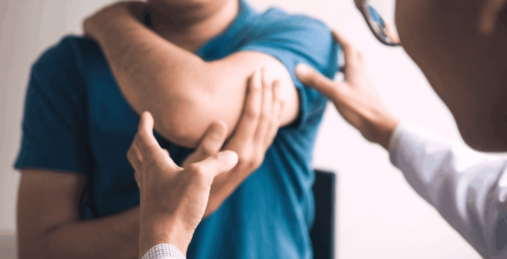 Image of a doctor examining under a patients arm.